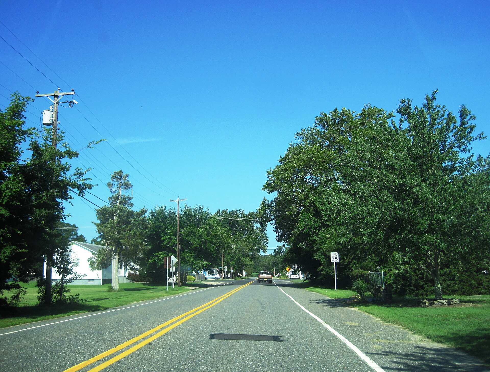 Photo showing westbound County Route 548 in the unincorporated community of Port Elizabeth within Maurice River Township, New Jersey. Photo taken approaching Port Cumberland Road (CR 646).