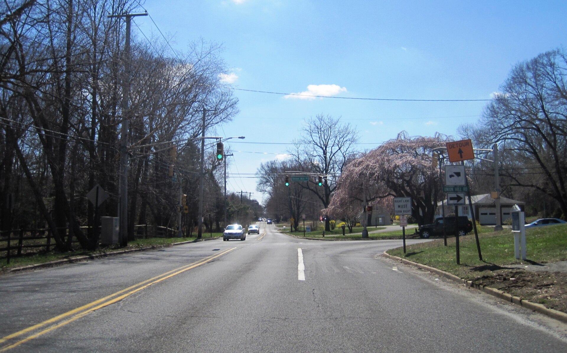 Photo of Robertsville, New Jersey, an unincorporated community within Marlboro Township. Photo taken looking south along Tennent Road (County Route 3) at Union Hill Road.
