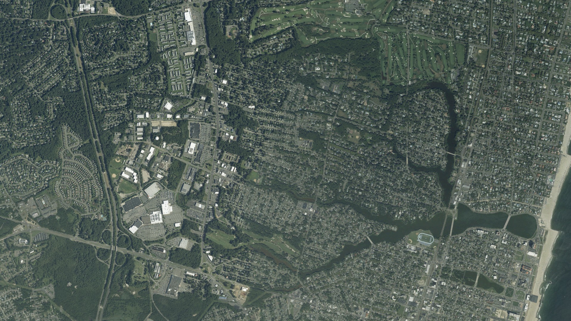 Natural-color aerial photograph of land around Wanamassa, New Jersey