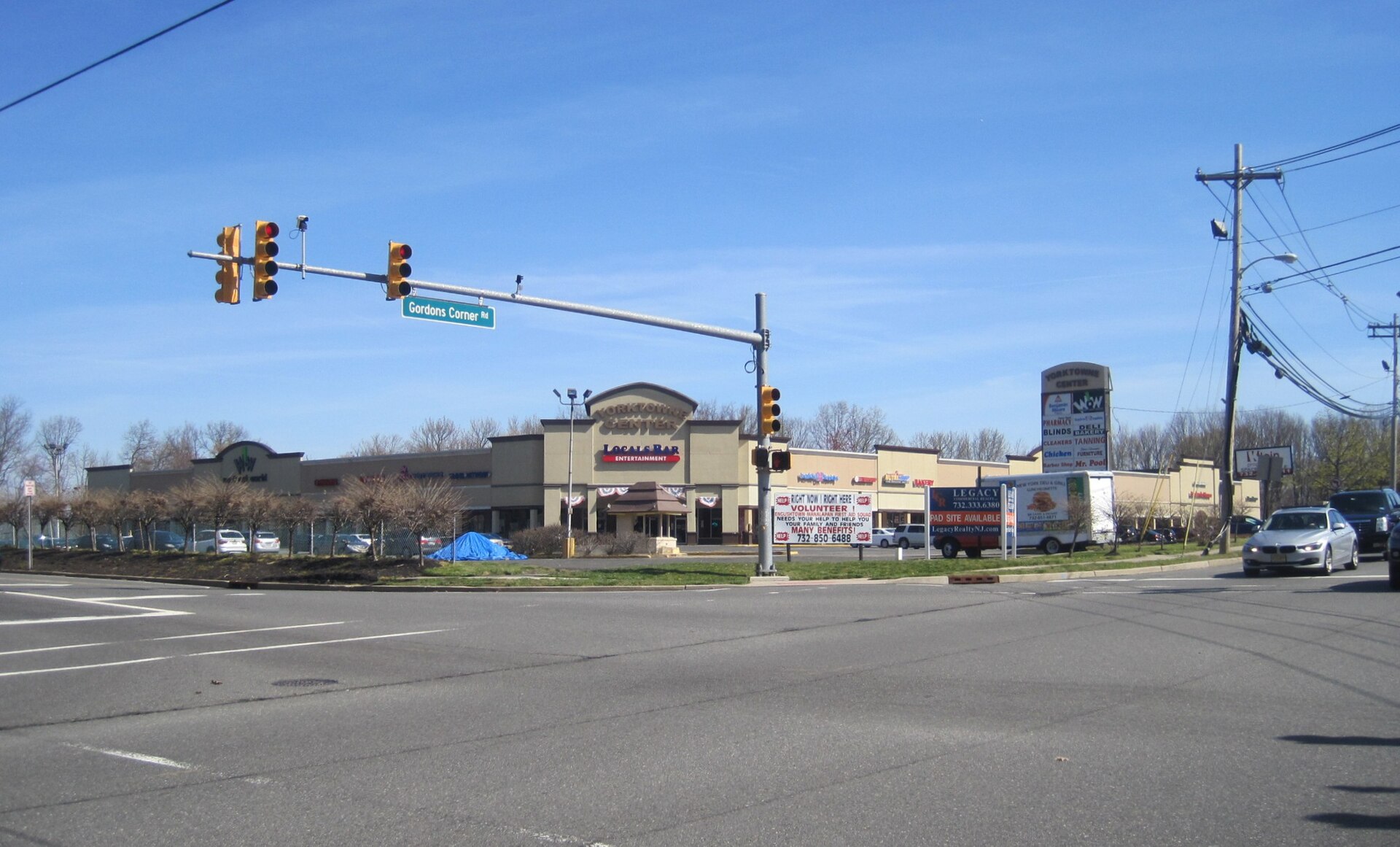 Photo of Yorketown, New Jersey, a census-designated place within Manalapan Township. Photo taken looking at Yorketown Center, a shopping plaza located at the intersection of Gordons Corner Road and Pease Road.