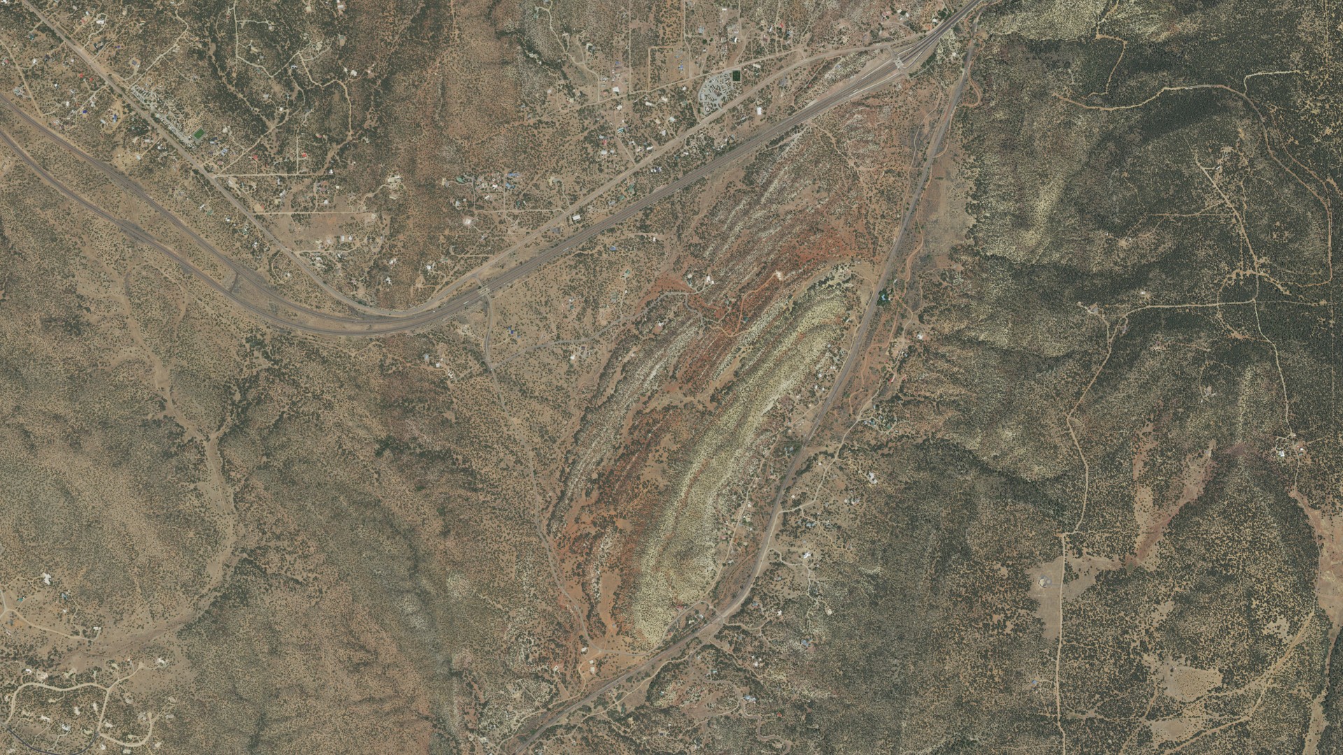 Natural-color aerial photograph of land around Cañoncito, New Mexico