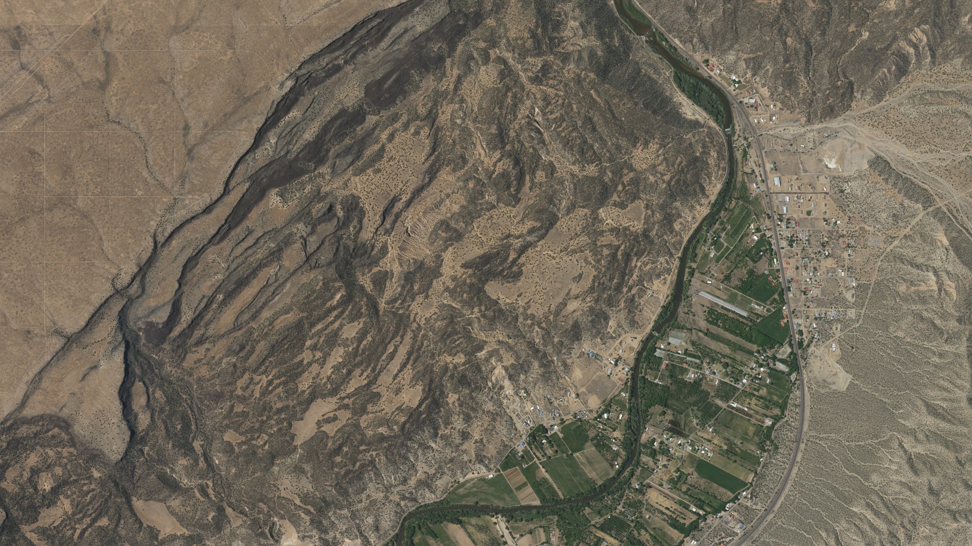 Natural-color aerial photograph of land around Canova, New Mexico
