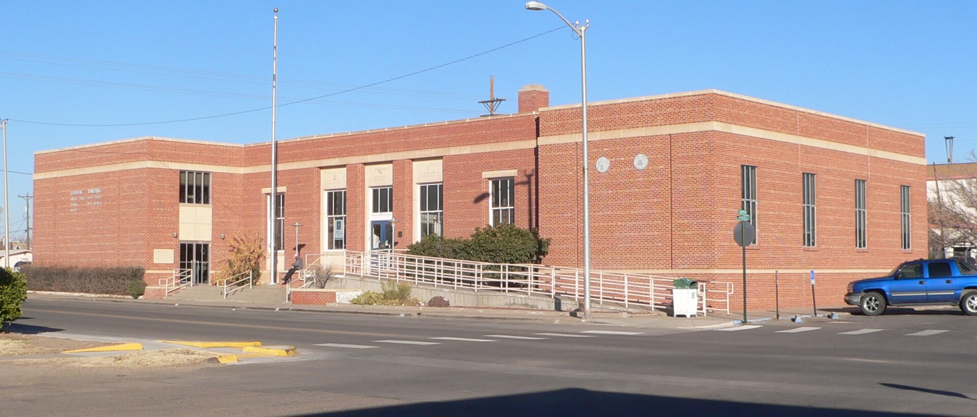 U.S. Post Office, located at 201 W. Spruce Street in Deming, New Mexico; seen from the southeast.