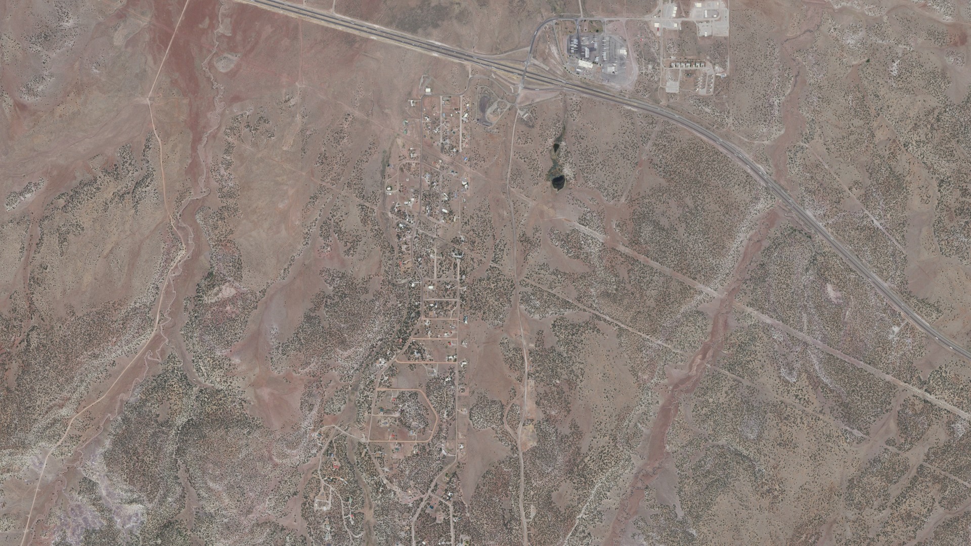 Natural-color aerial photograph of land around Jamestown, New Mexico