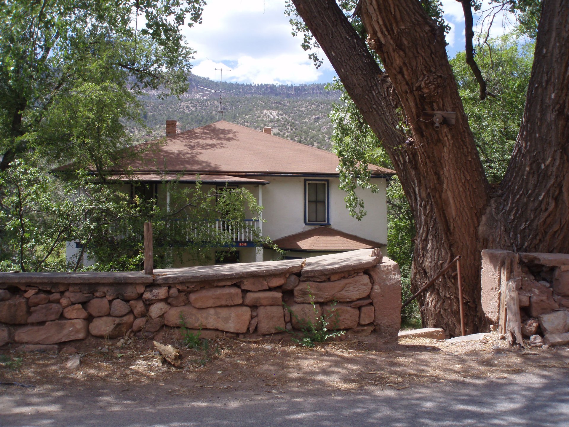 I always loved this house with its stone wall, and the cottonwood trees. — Jemez Springs, New Mexico