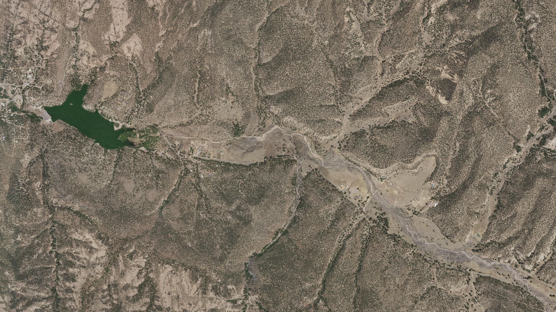 Natural-color aerial photograph of land around Lake Roberts Heights, New Mexico