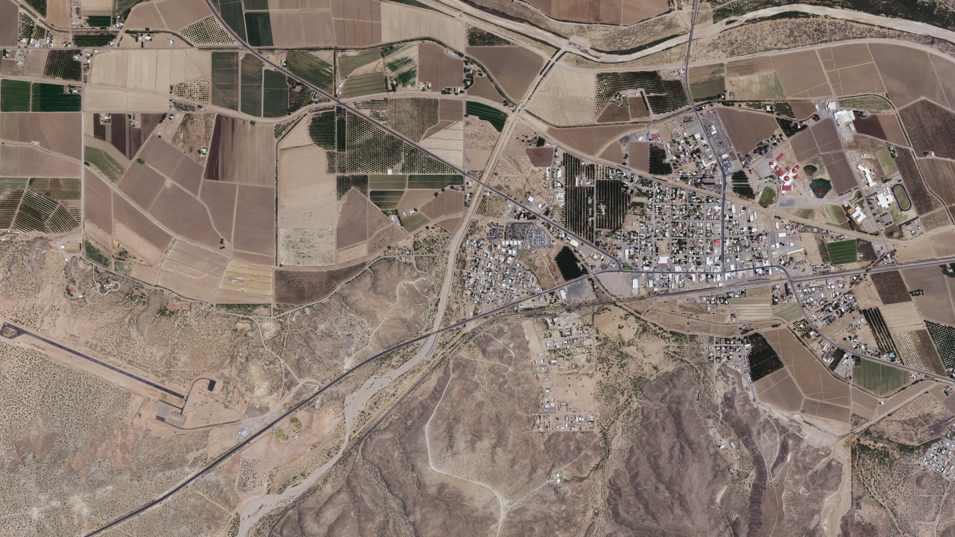 Natural-color aerial photograph of land around Placitas, New Mexico