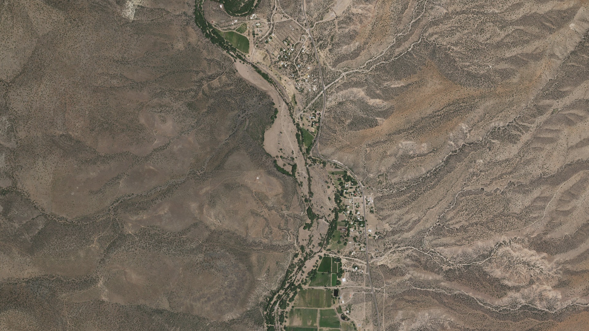 Natural-color aerial photograph of land around Pleasanton, New Mexico