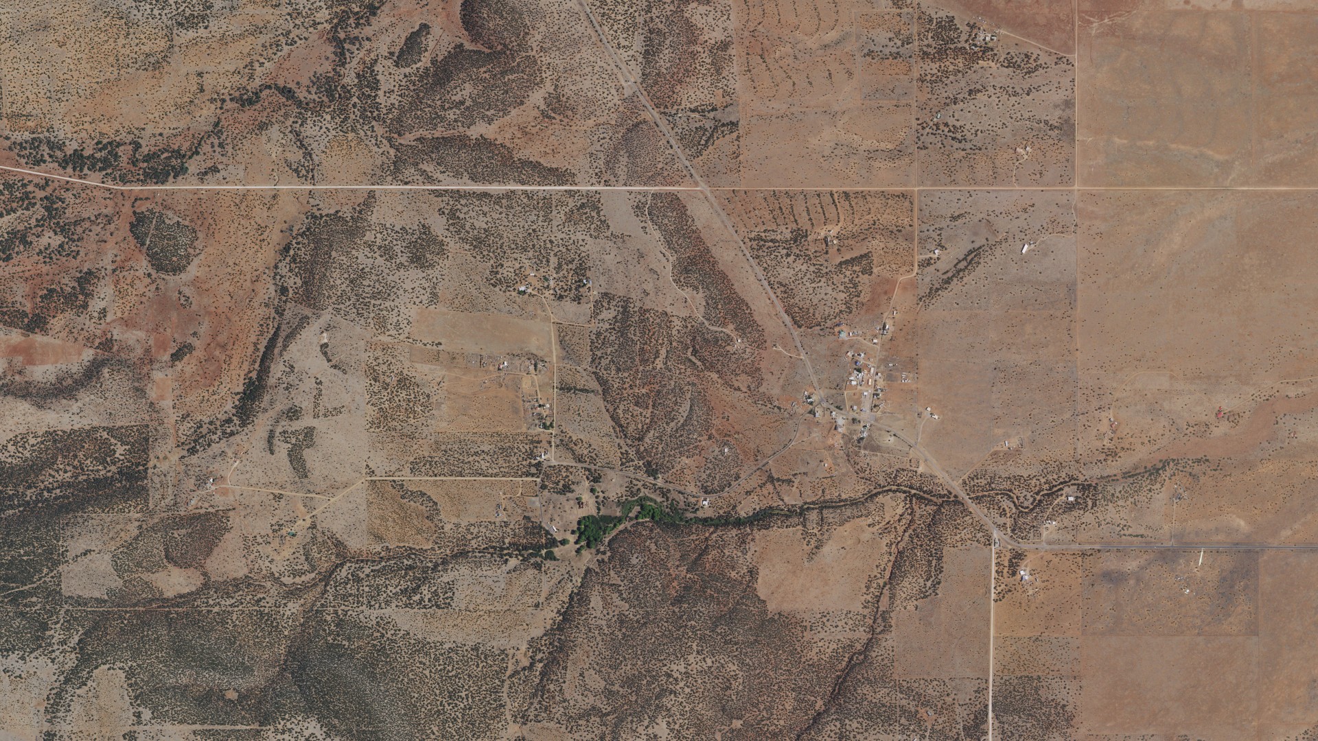 Natural-color aerial photograph of land around Punta de Agua, New Mexico