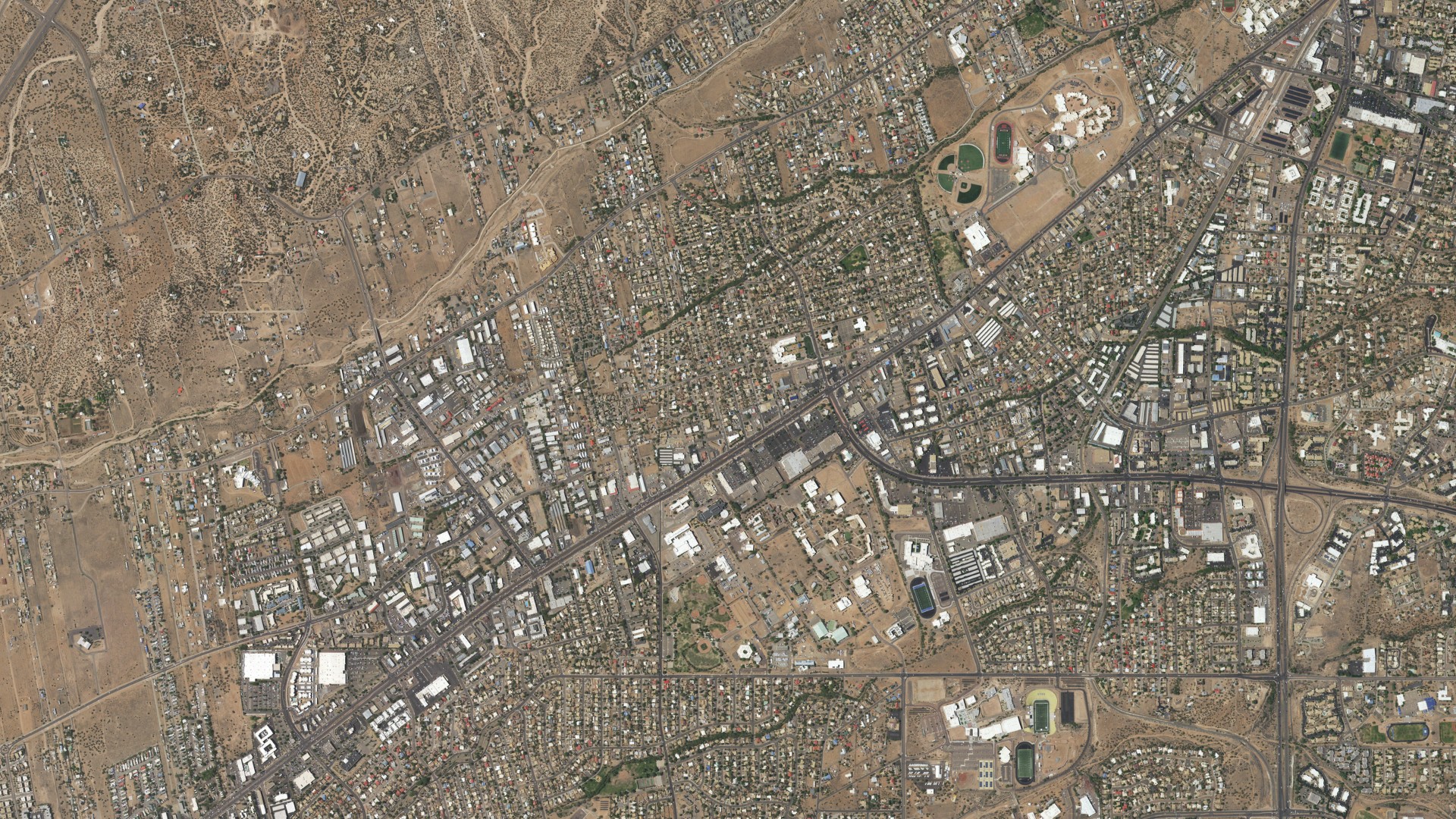 Natural-color aerial photograph of land around Santa Fe, New Mexico