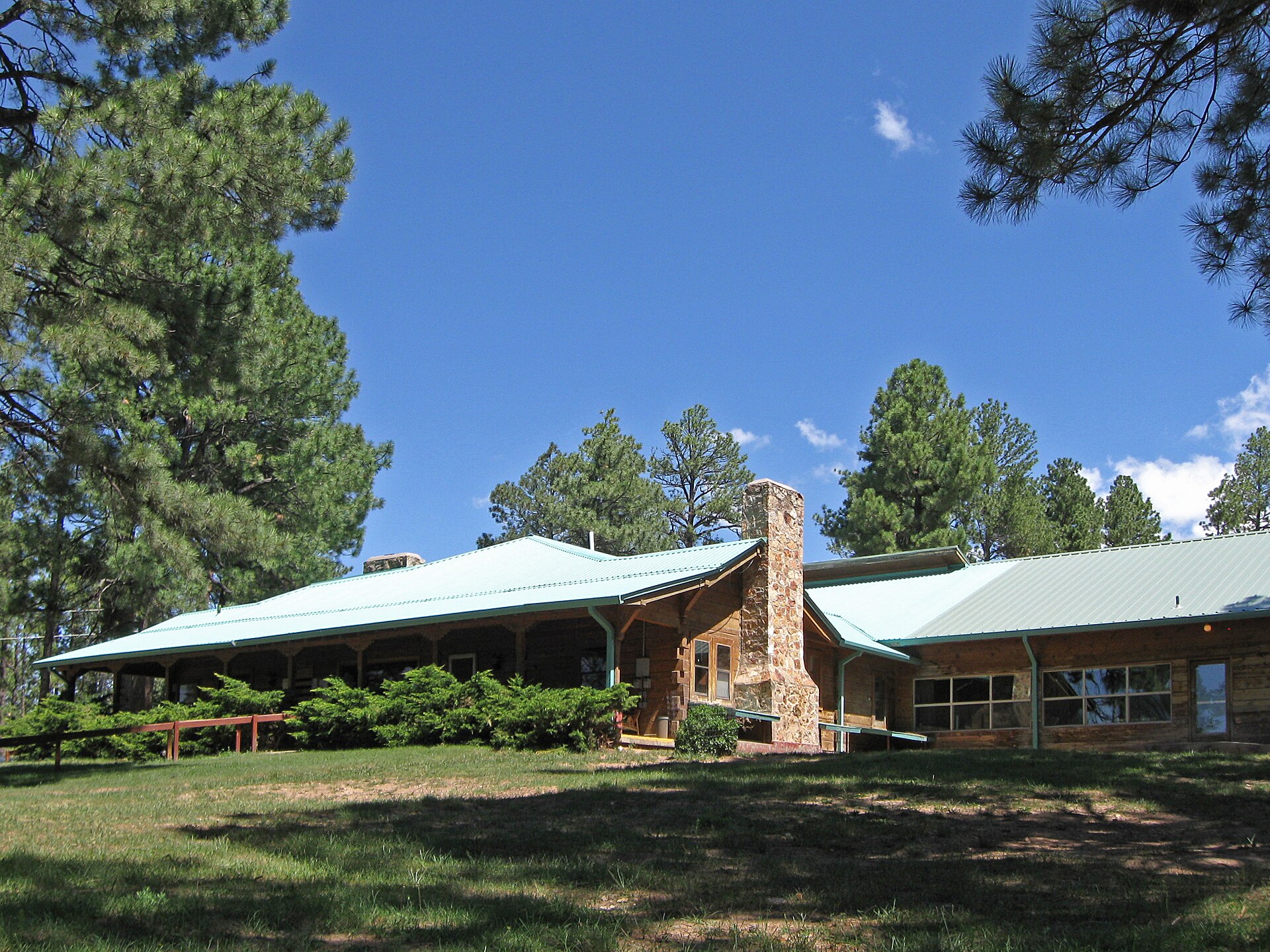 Timberon Lodge, also known as the Community Center, located at the north end of Merlin Drive in Timberon, New Mexico. The public library and the offices of the water district are housed here.