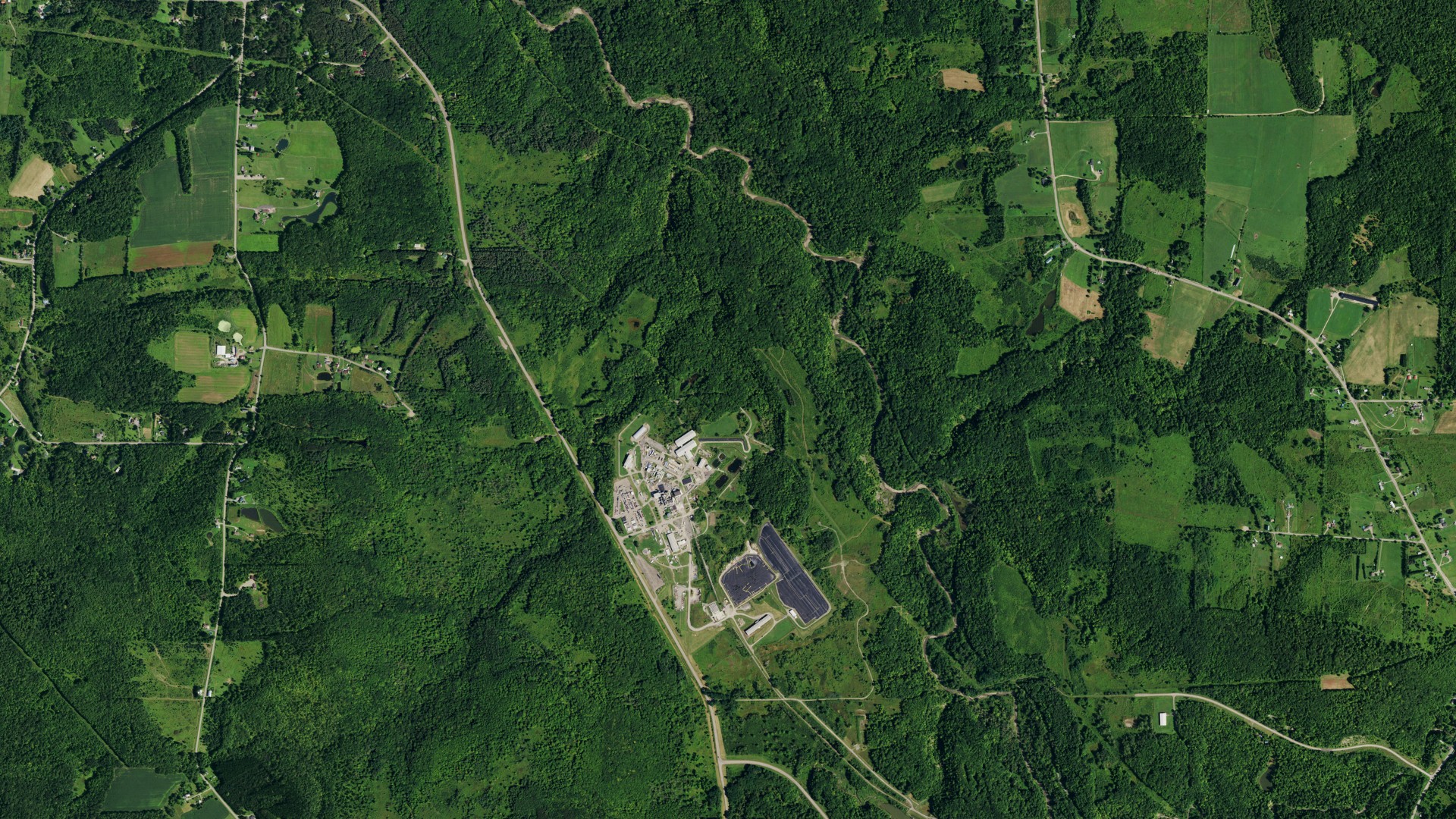 Natural-color aerial photograph of land around Ashford, New York