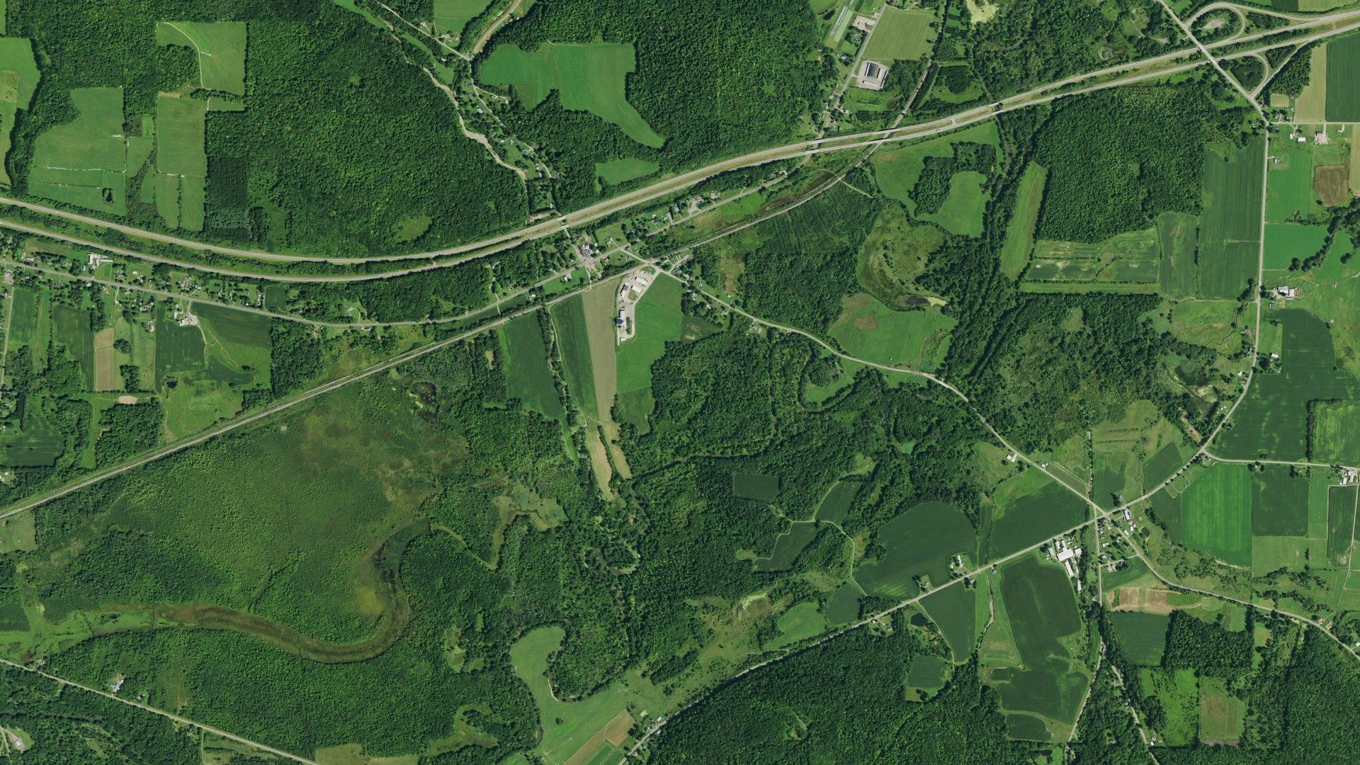Natural-color aerial photograph of land around Poland, New York