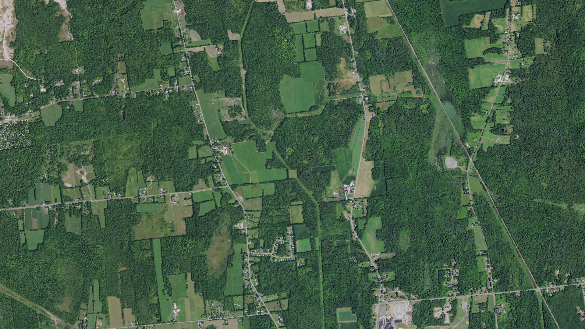 Natural-color aerial photograph of land around Beekmantown, New York