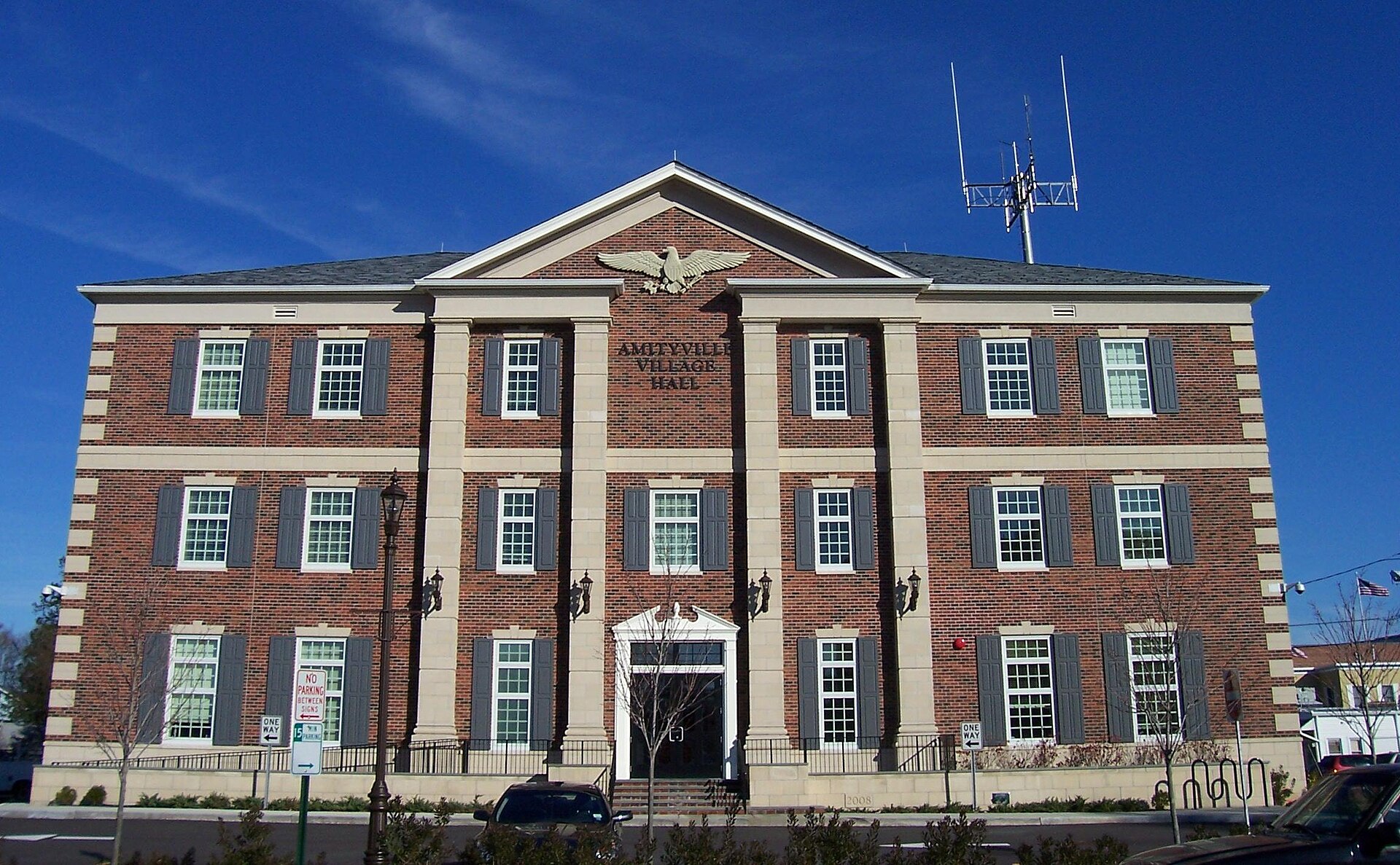 The new Amityville Village Hall, Amityville, New York, built in 2008, at least according to the cornerstone visible to the right of the door.