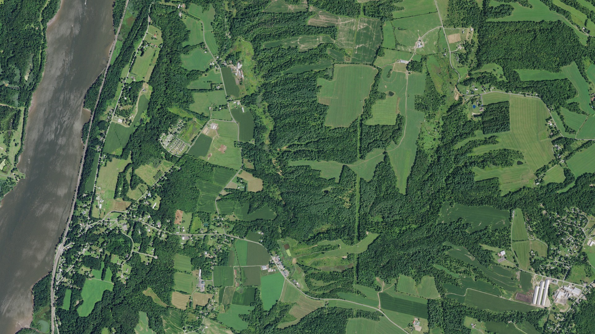 Natural-color aerial photograph of land around Stuyvesant, New York