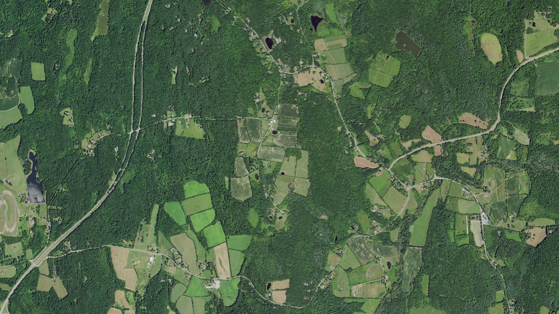 Natural-color aerial photograph of land around Taghkanic, New York