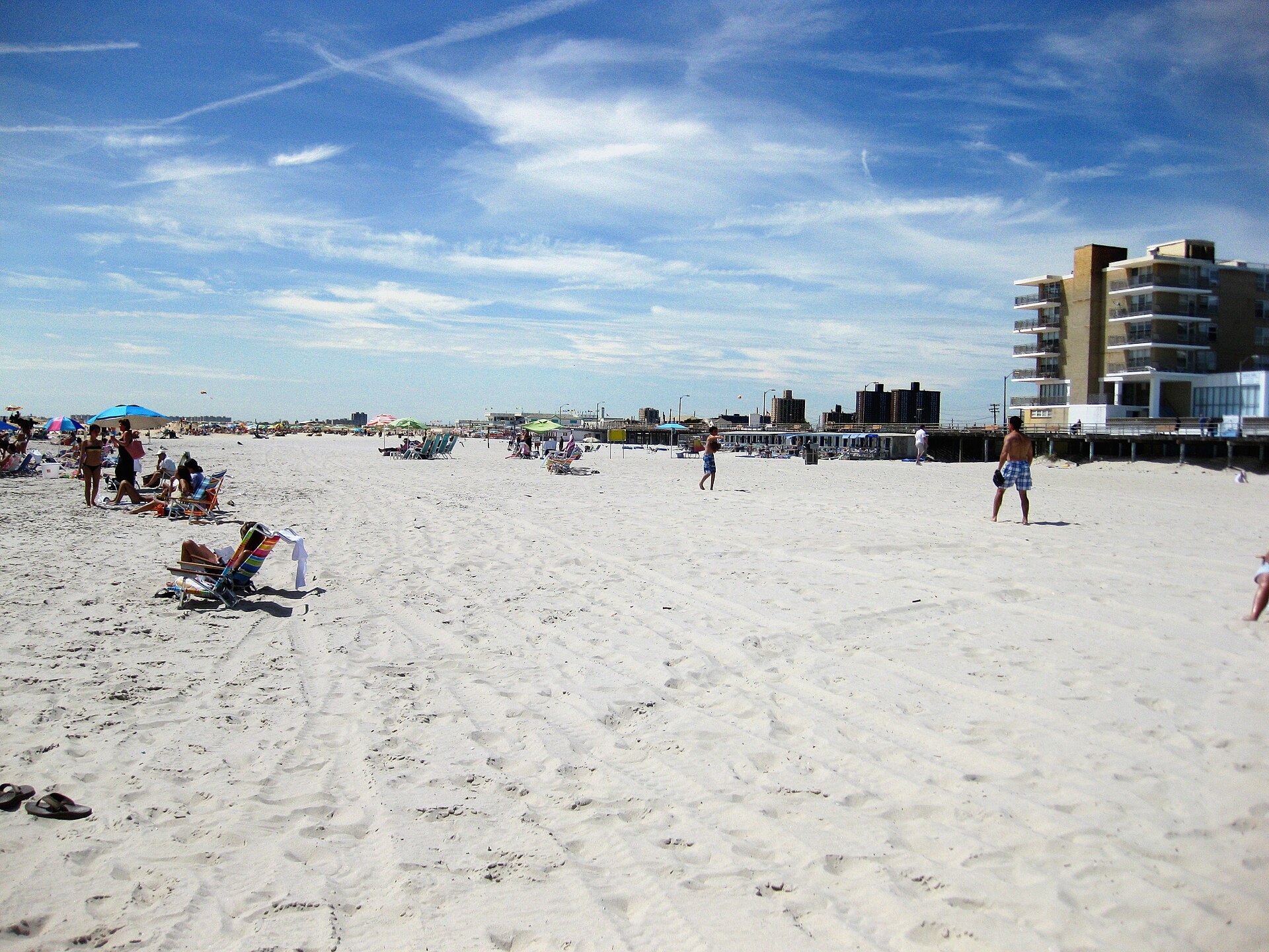 The beach in the village of Atlantic Beach on Long Island, NY. This photo was taken facing northwest. The boardwalk is visible on the right hand side of the photo. — New York