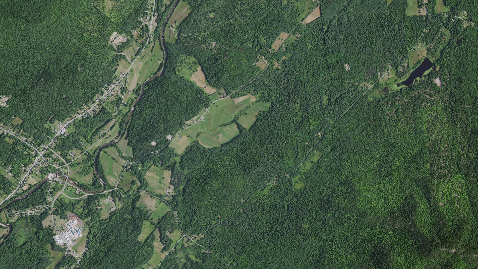 Natural-color aerial photograph of land around Jay, New York