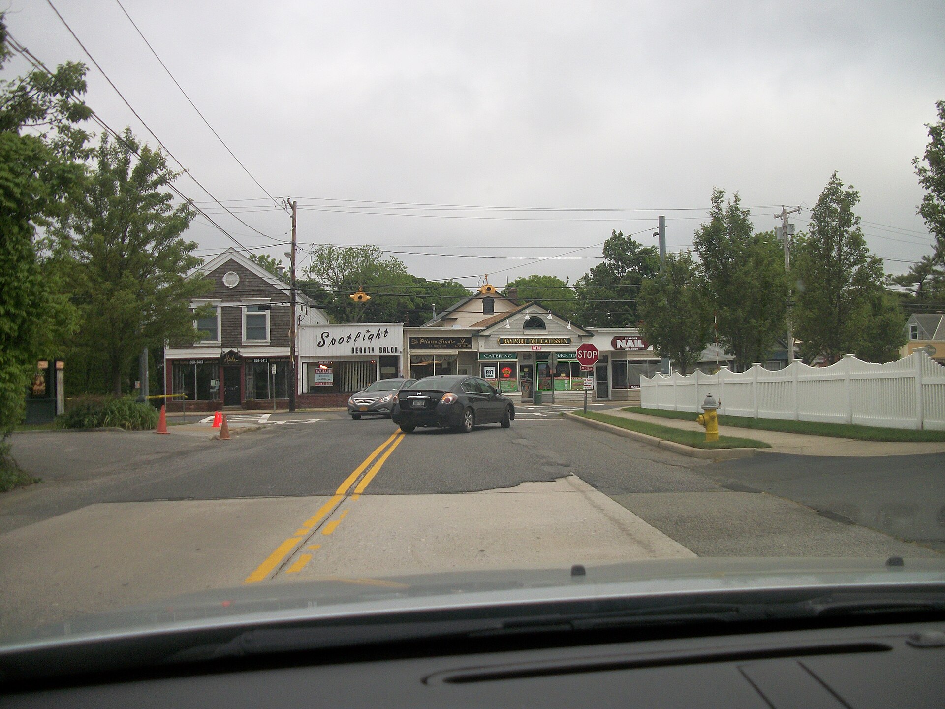 Southbound Bayport Avenue as it approaches Middle Road(Suffolk County Road 65) in Bayport, New York.