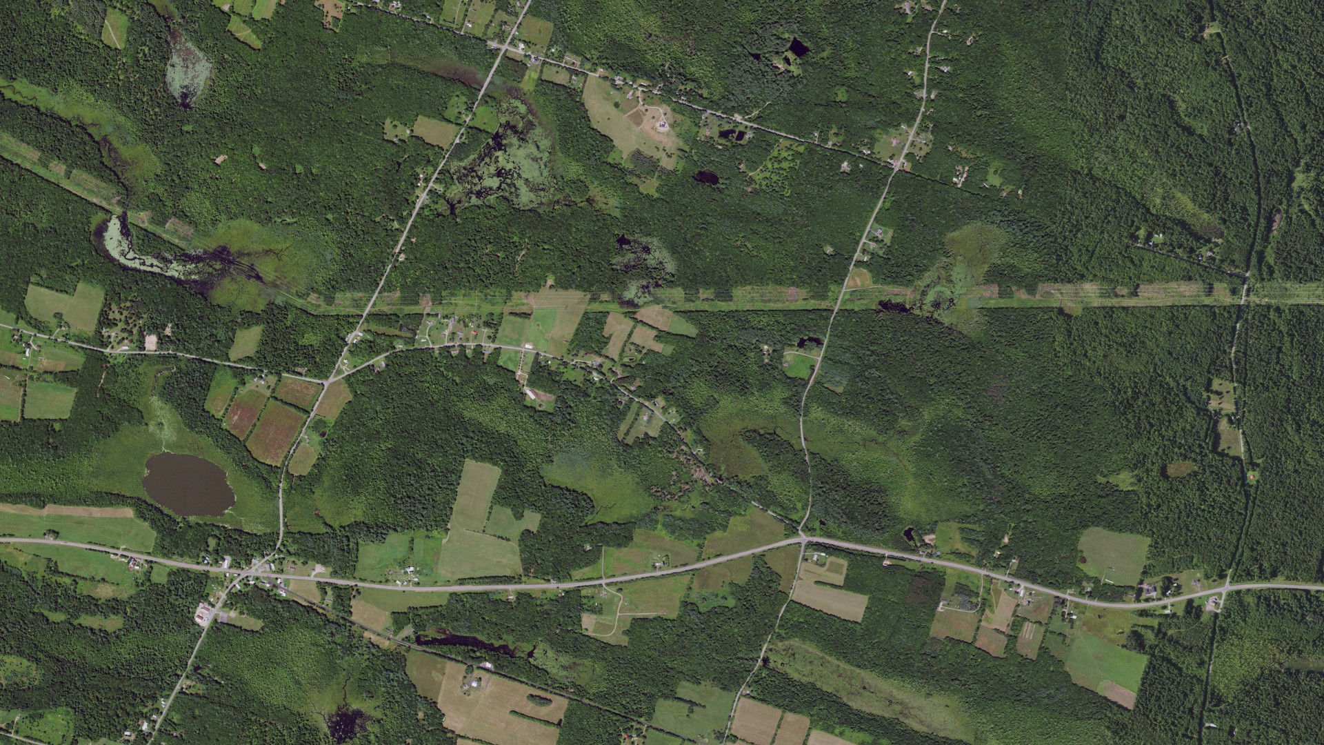 Natural-color aerial photograph of land around Amboy, New York