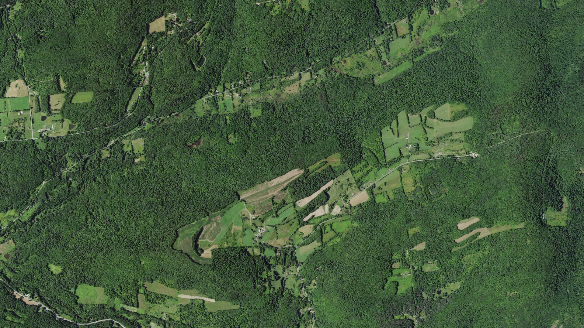 Natural-color aerial photograph of land around Roseboom, New York