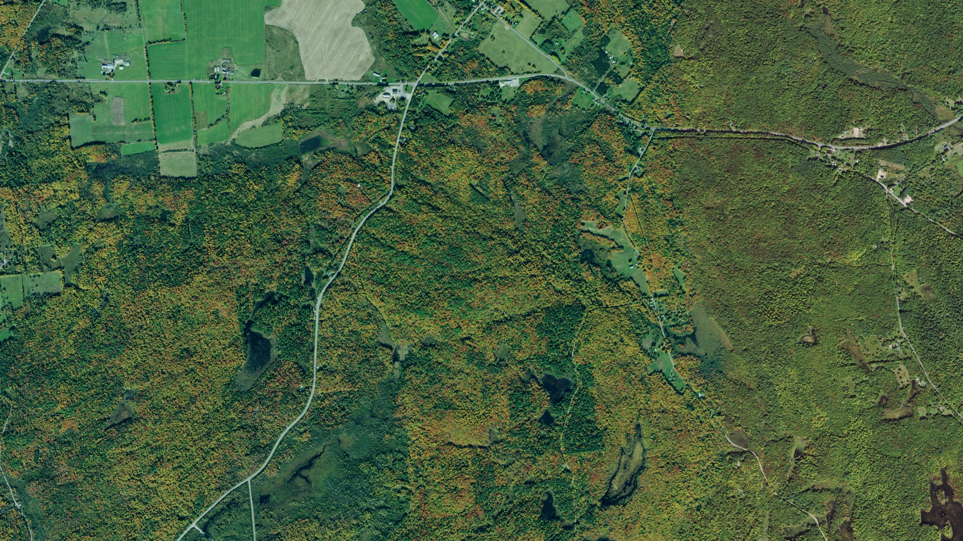 Natural-color aerial photograph of land around Pierrepont, New York