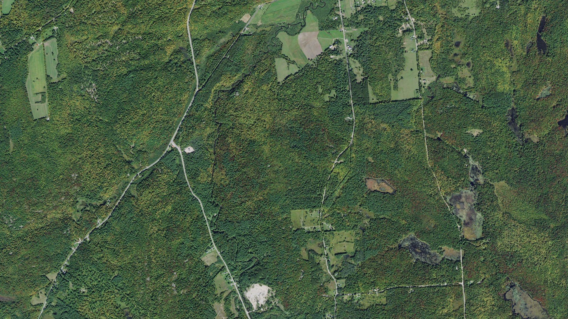 Natural-color aerial photograph of land around Russell, New York
