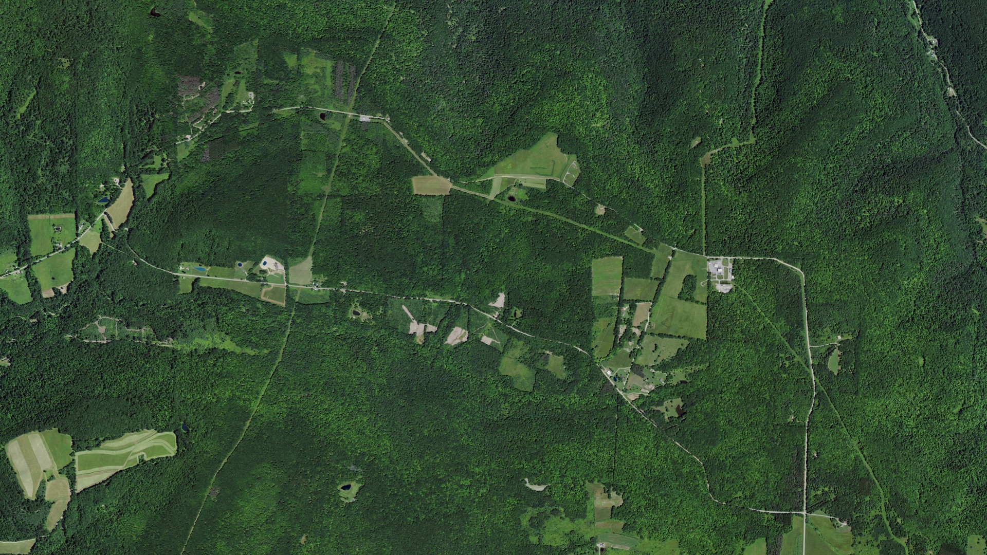 Natural-color aerial photograph of land around Canisteo, New York