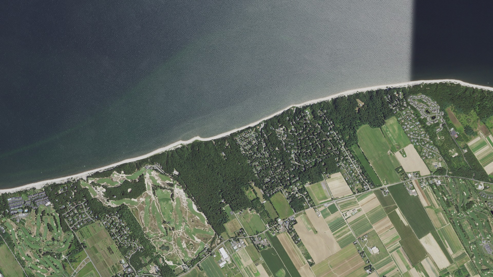 Natural-color aerial photograph of land around Riverhead, New York