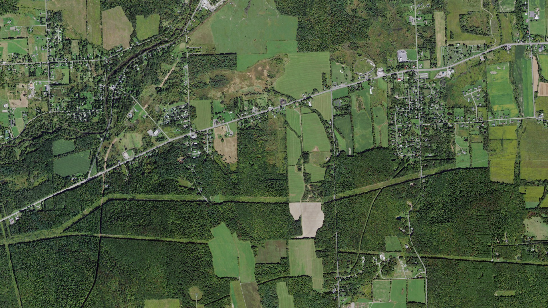 Natural-color aerial photograph of land around Dryden, New York