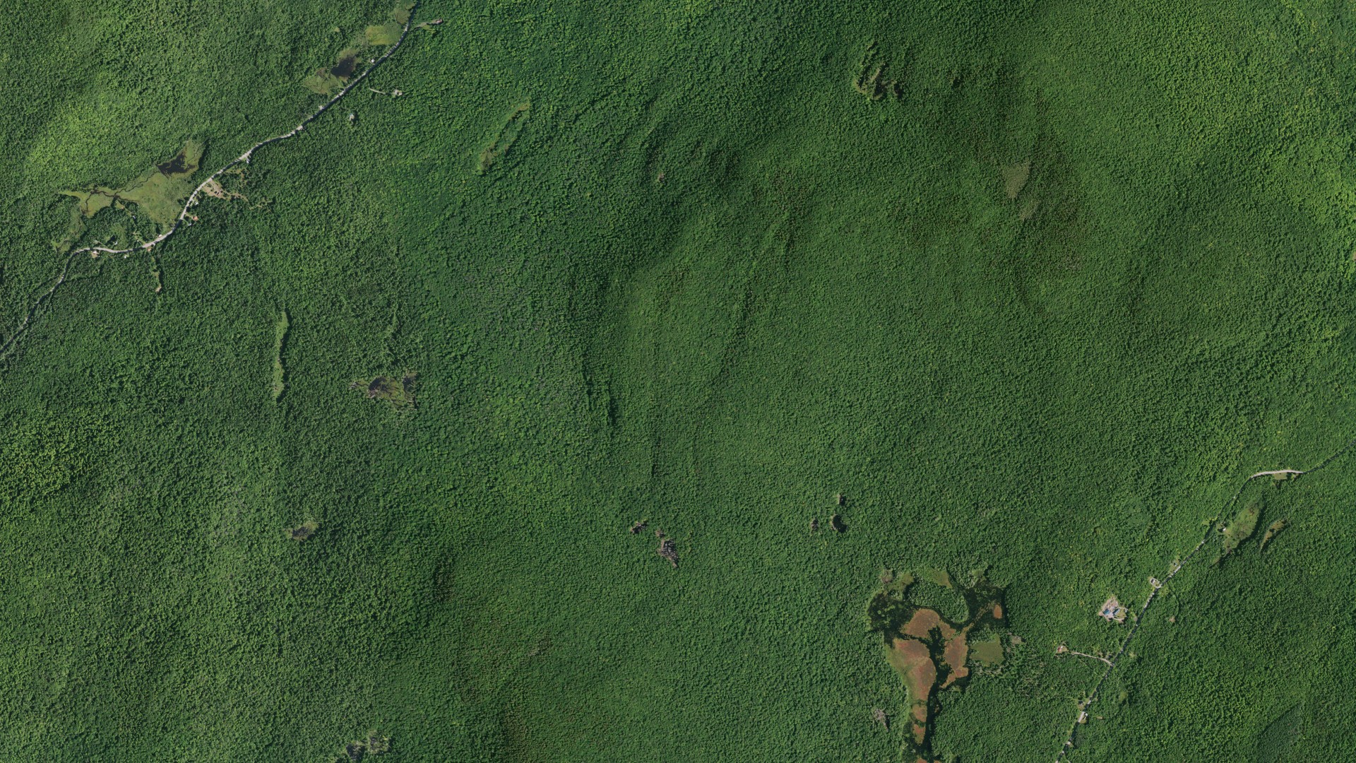 Natural-color aerial photograph of land around Stony Creek, New York