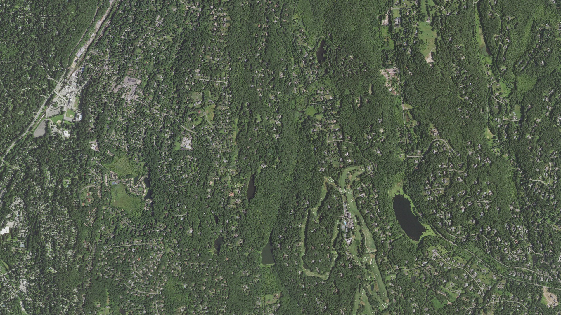 Natural-color aerial photograph of land around Westchester County, New York