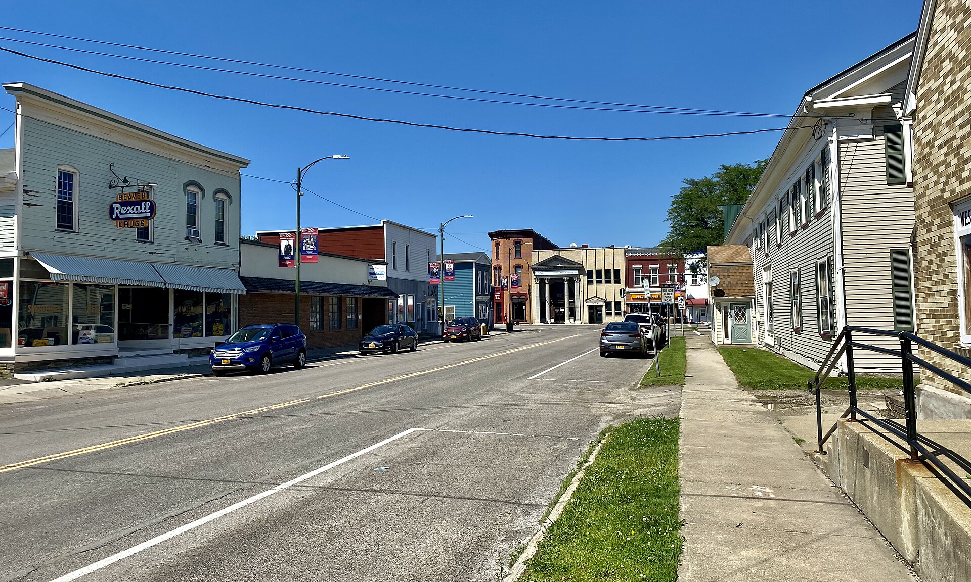 View looking north along Greenwood Street (NY 248) in the village center of Canisteo, New York, on a pleasant June 2021 afternoon.