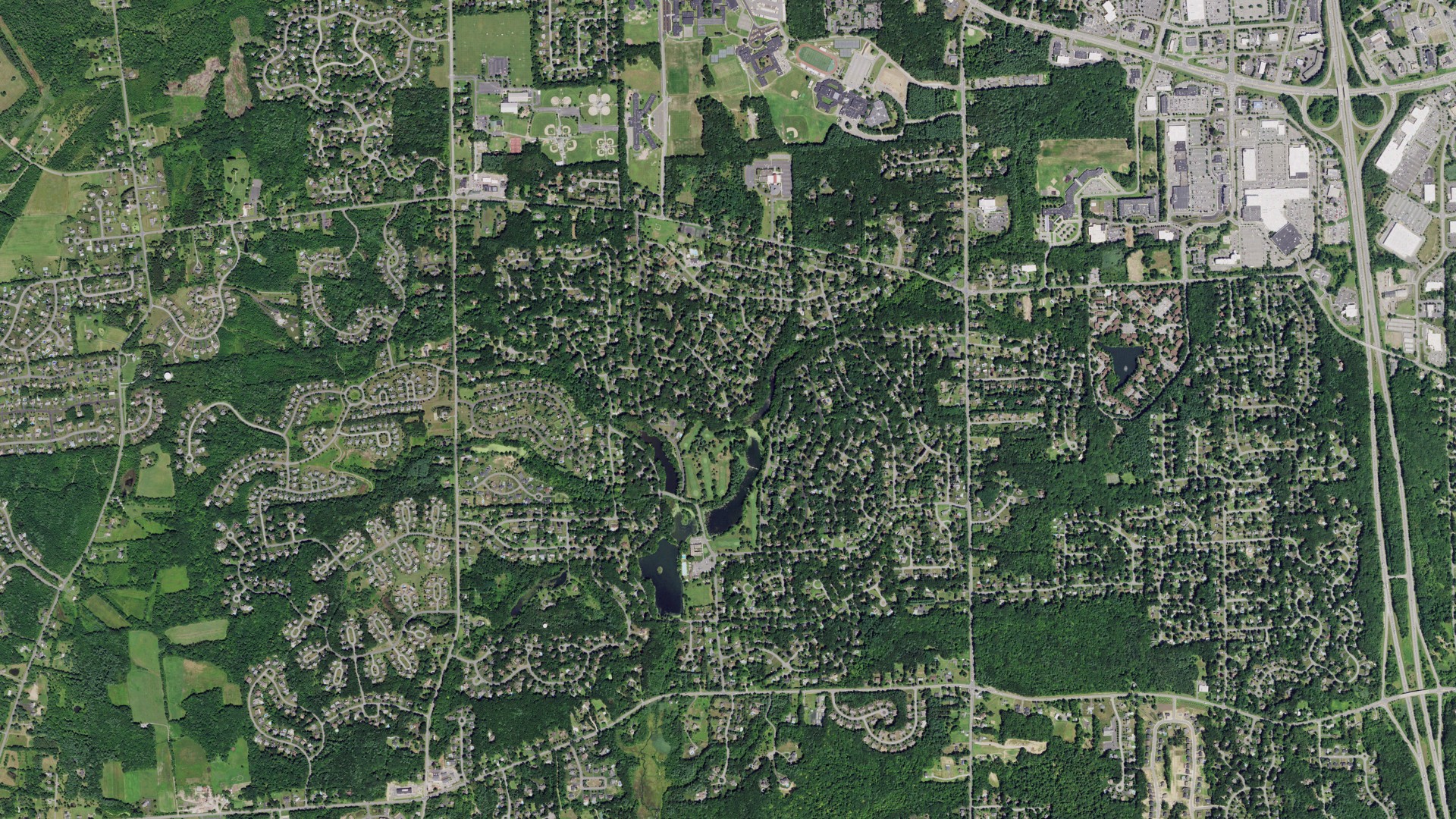 Natural-color aerial photograph of land around Clifton Knolls-Mill Creek, New York