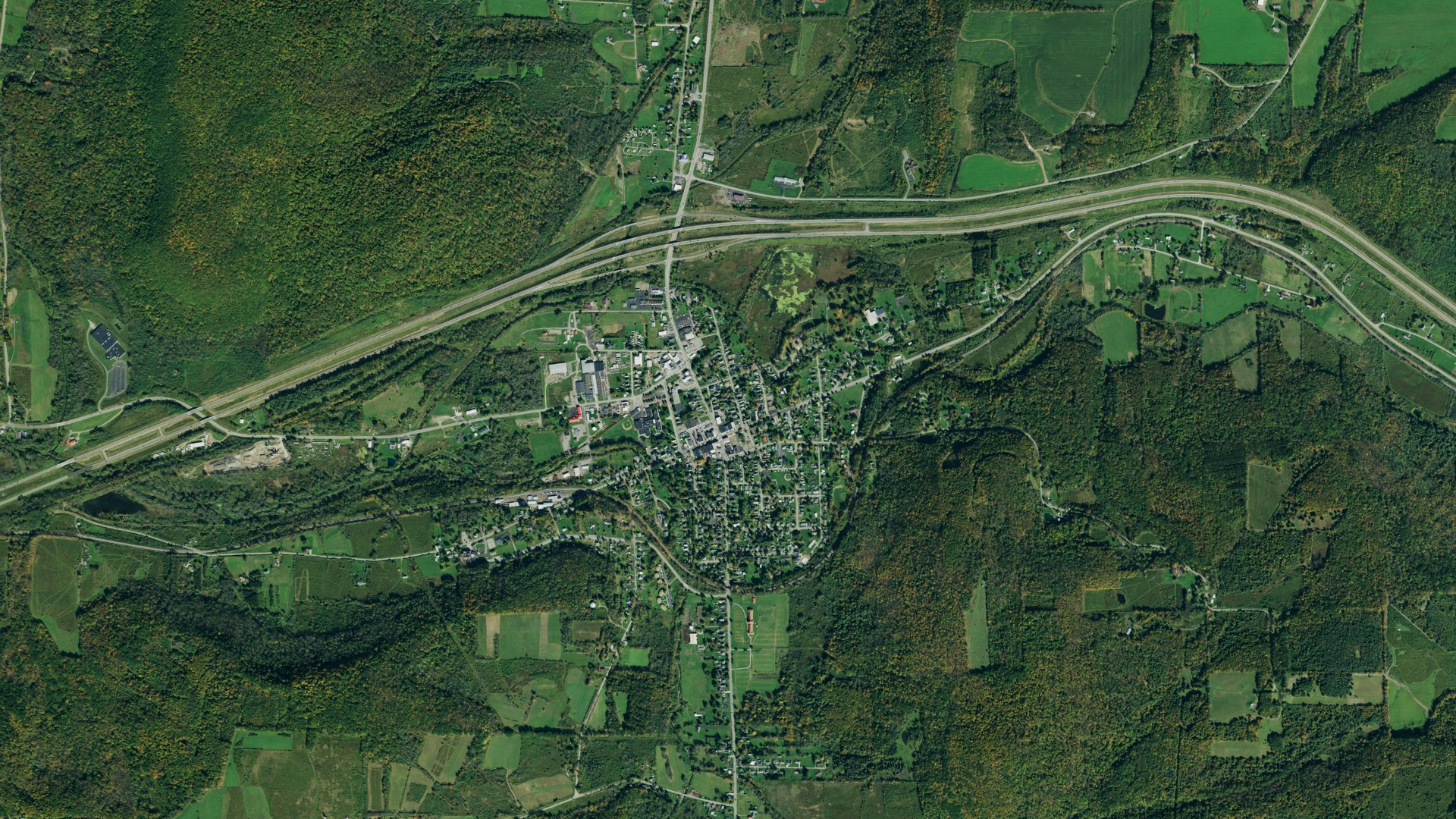Natural-color aerial photograph of land around Cuba, New York