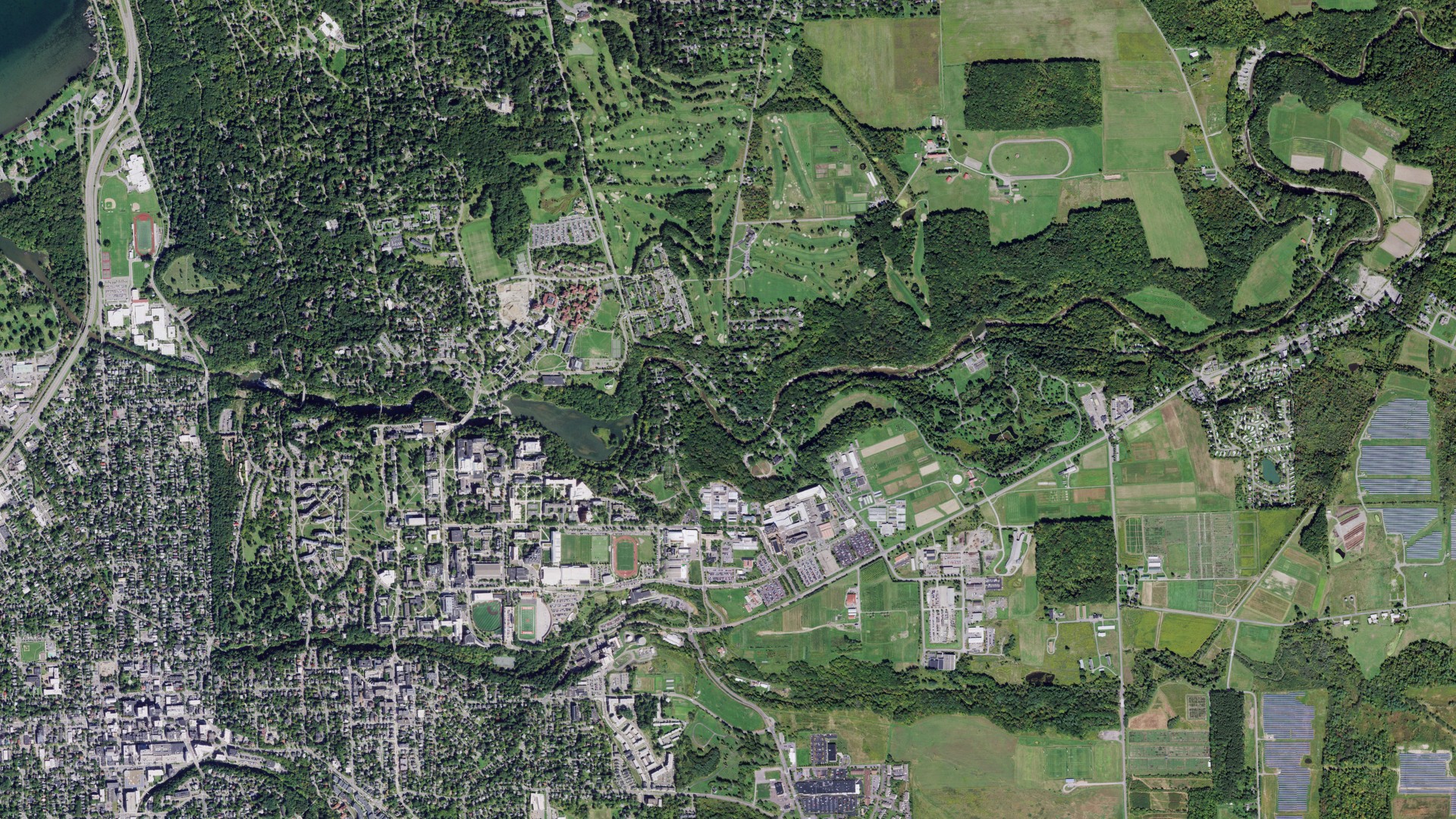 Natural-color aerial photograph of land around Forest Home, New York
