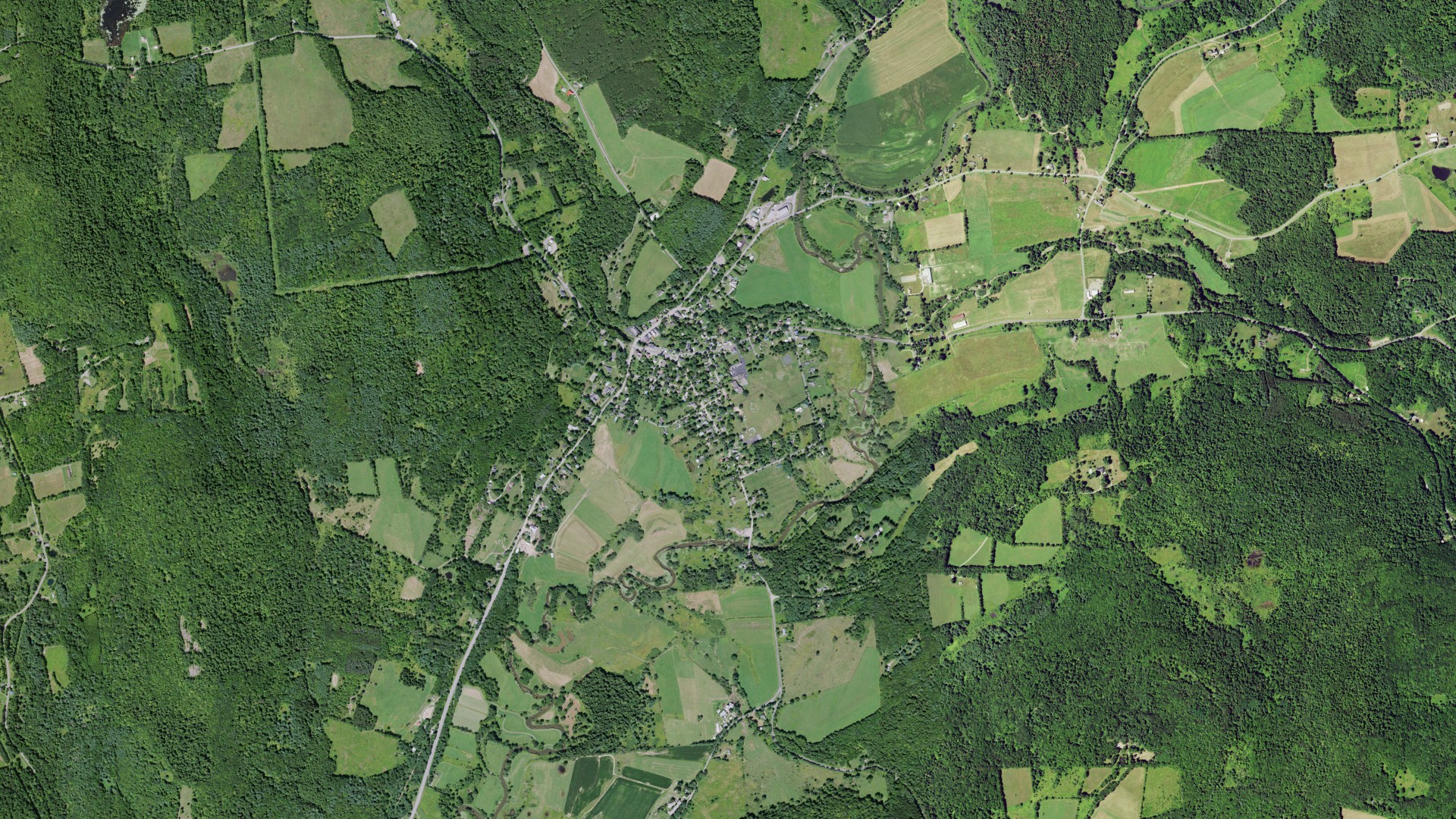 Natural-color aerial photograph of land around Gilbertsville, New York