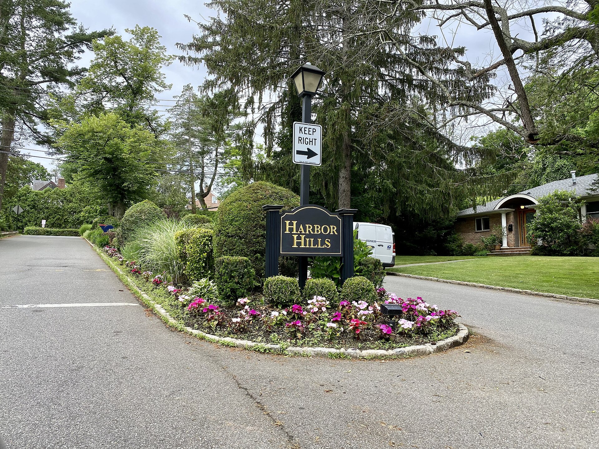 A welcome sign to Harbor Hills, Long Island, New York. This photo was taken on June 11, 2021.