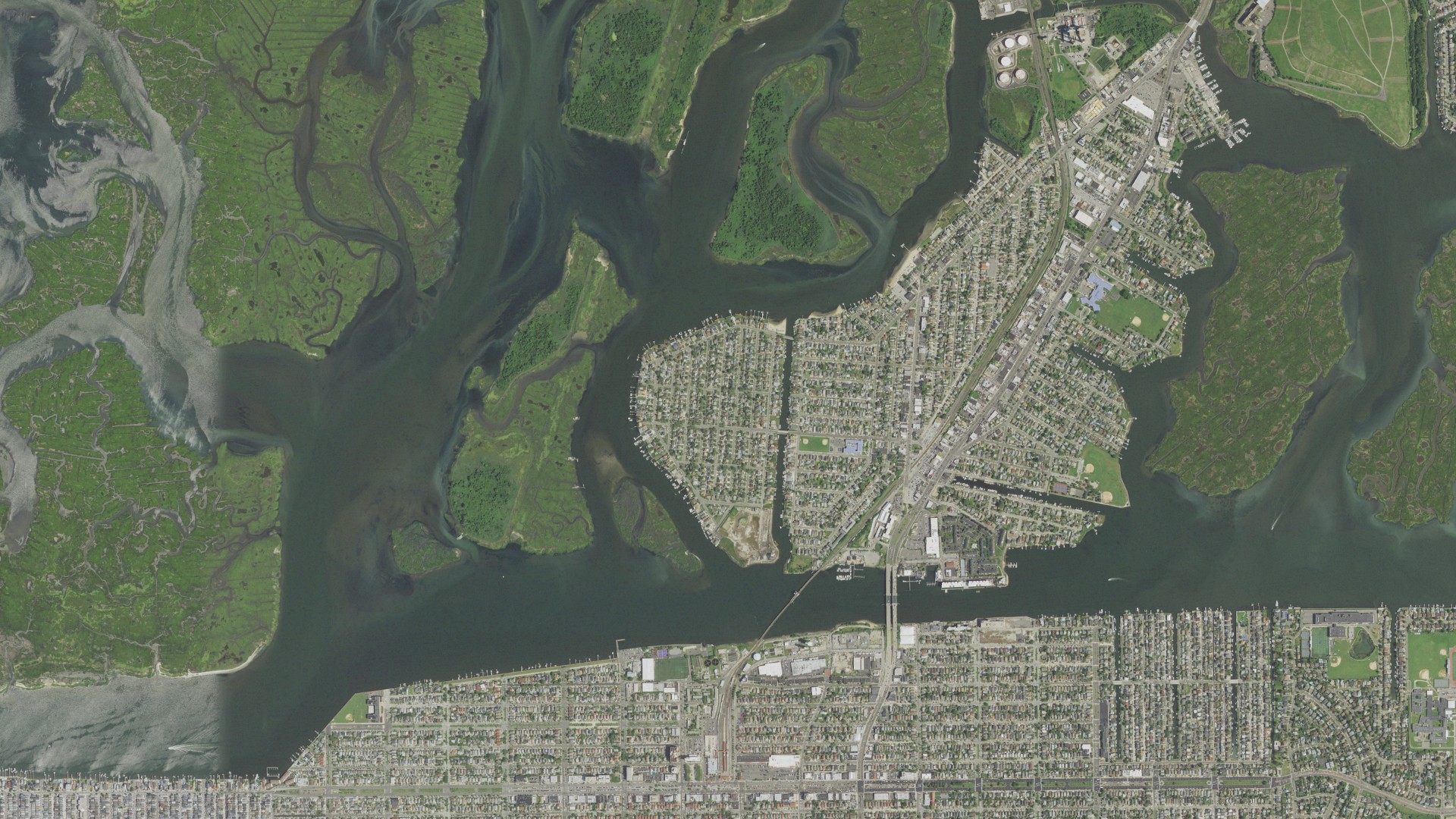 Natural-color aerial photograph of land around Harbor Isle, New York