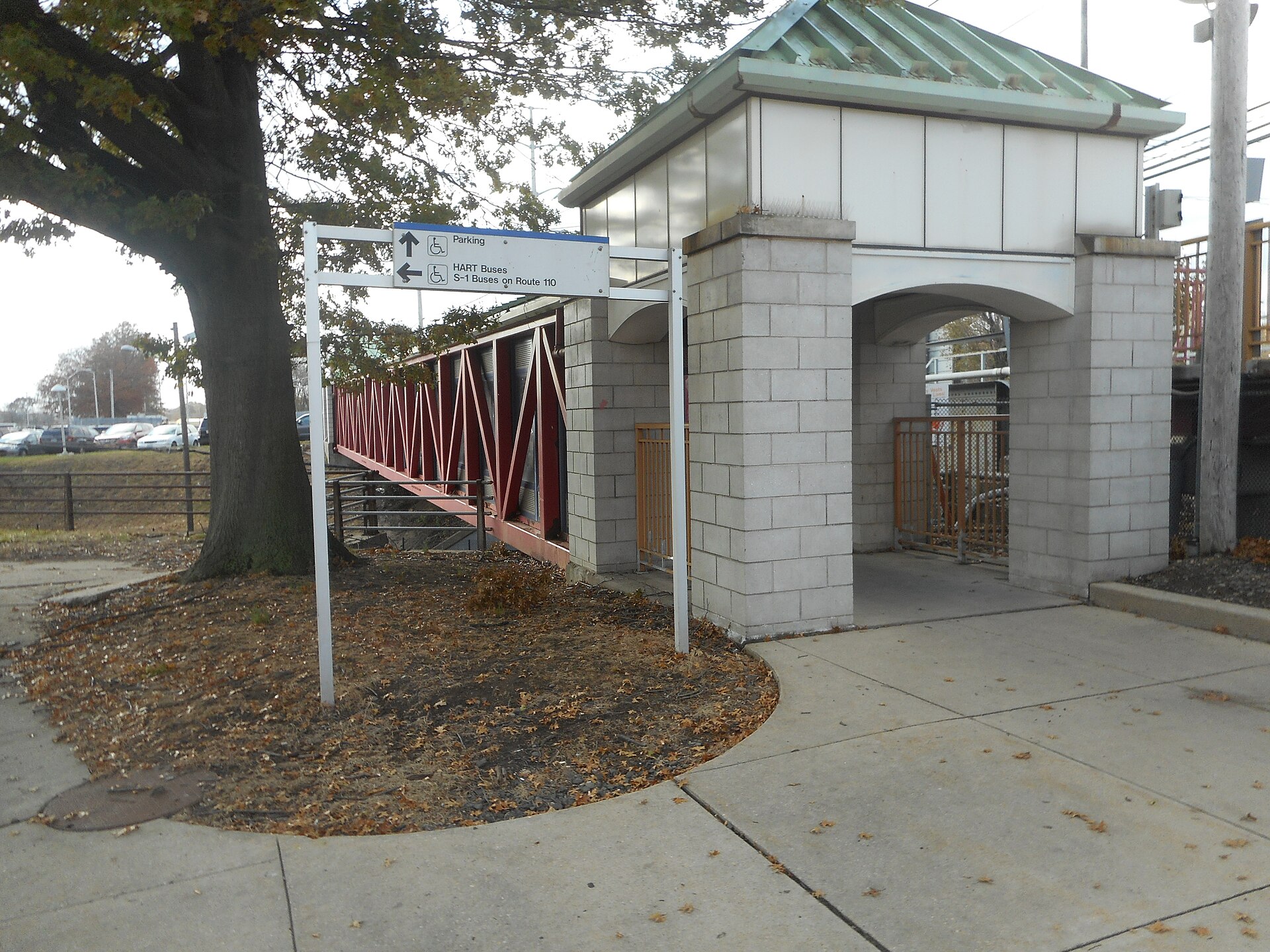 Looking west at one of the pedestrian bridges at Huntington (LIRR station) in Huntington Station, New York, specifically the one over New York State Route 110 on the south side of the railroad bridge.