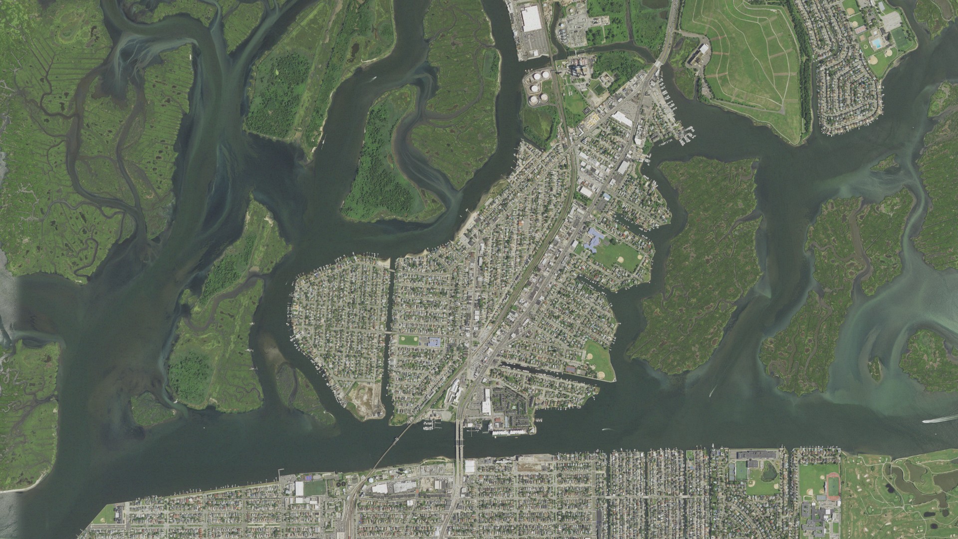 Natural-color aerial photograph of land around Island Park, New York