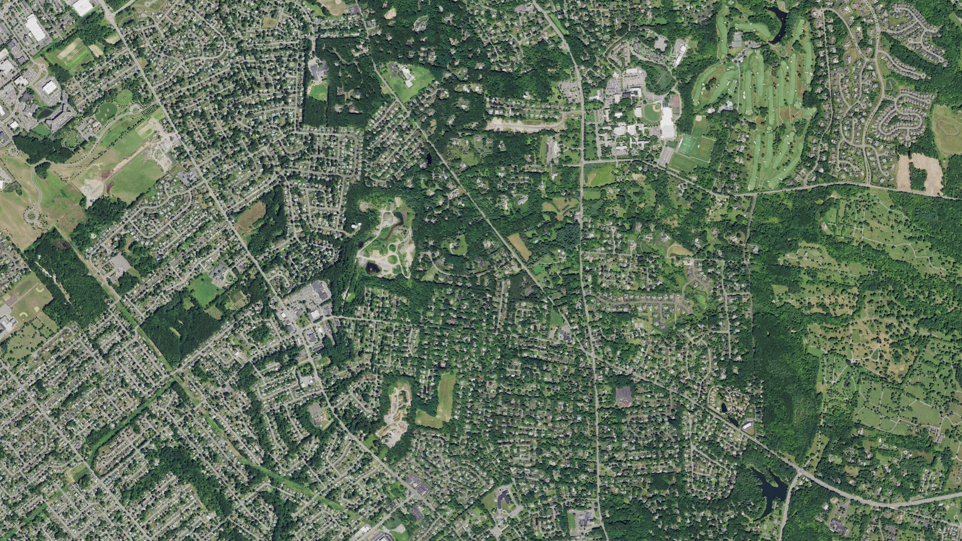 Natural-color aerial photograph of land around Loudonville, New York