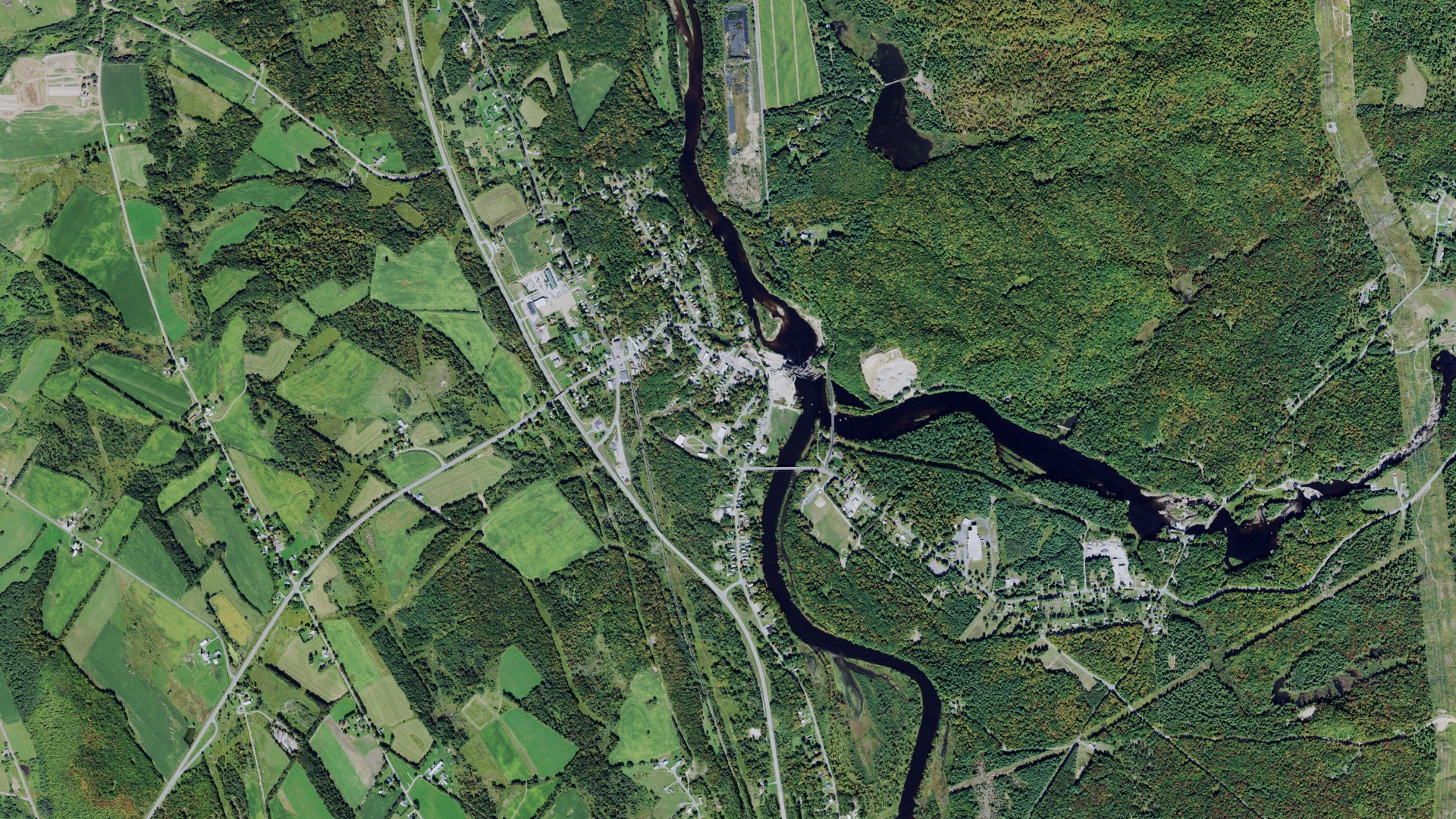 Natural-color aerial photograph of land around Lyons Falls, New York