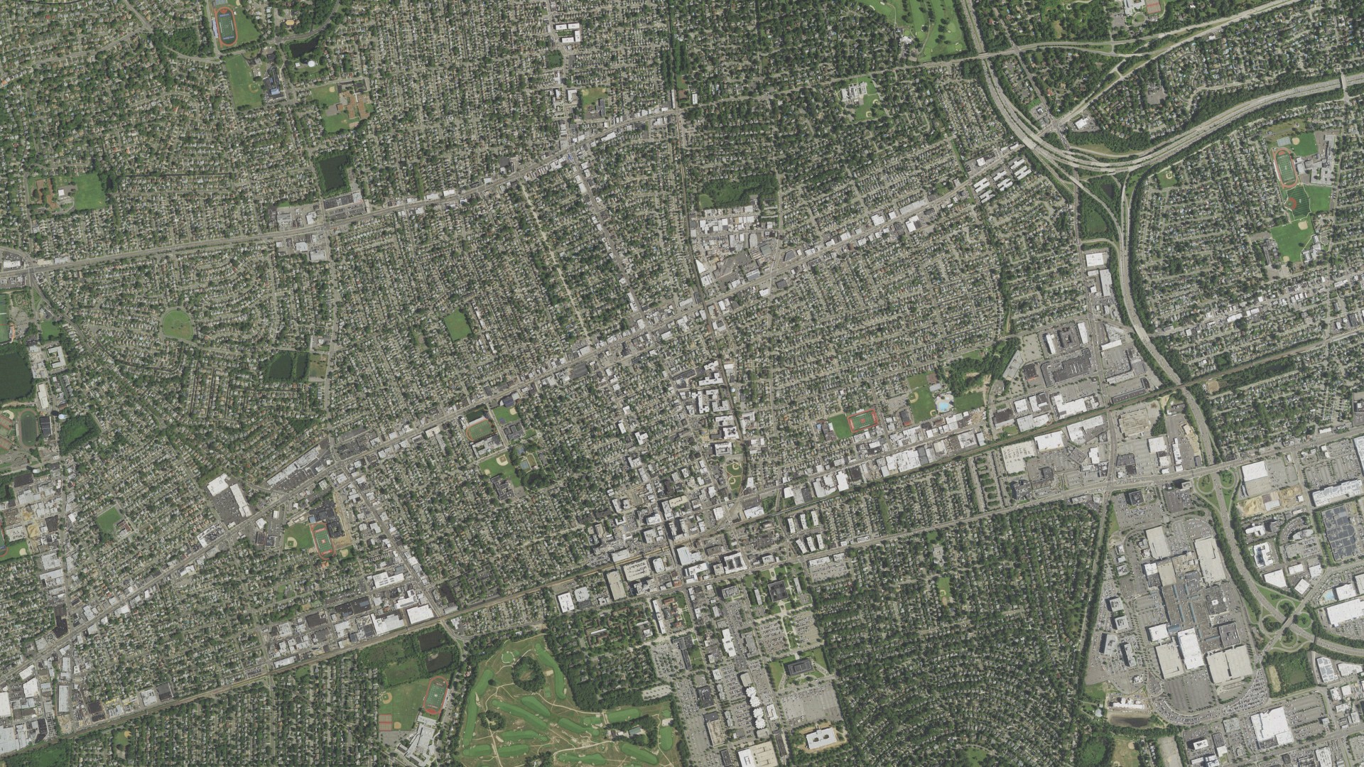 Natural-color aerial photograph of land around Mineola, New York