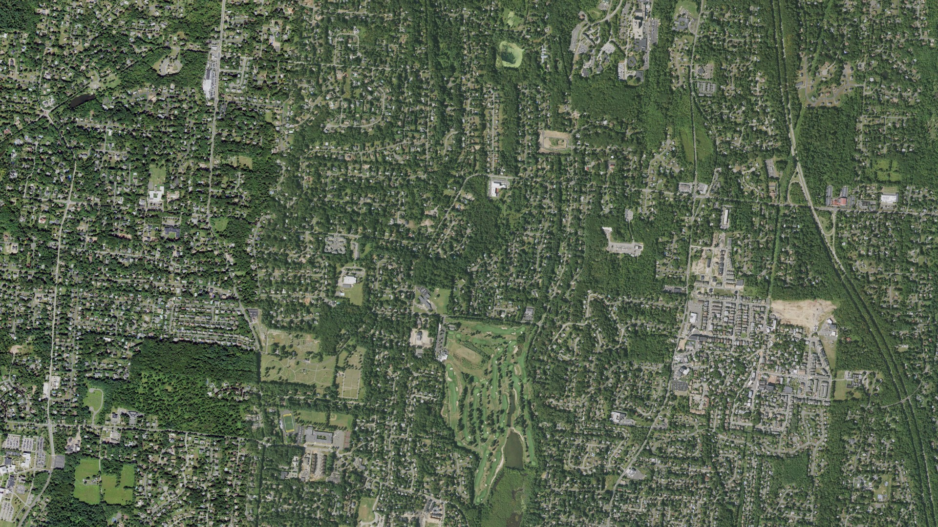 Natural-color aerial photograph of land around New Hempstead, New York