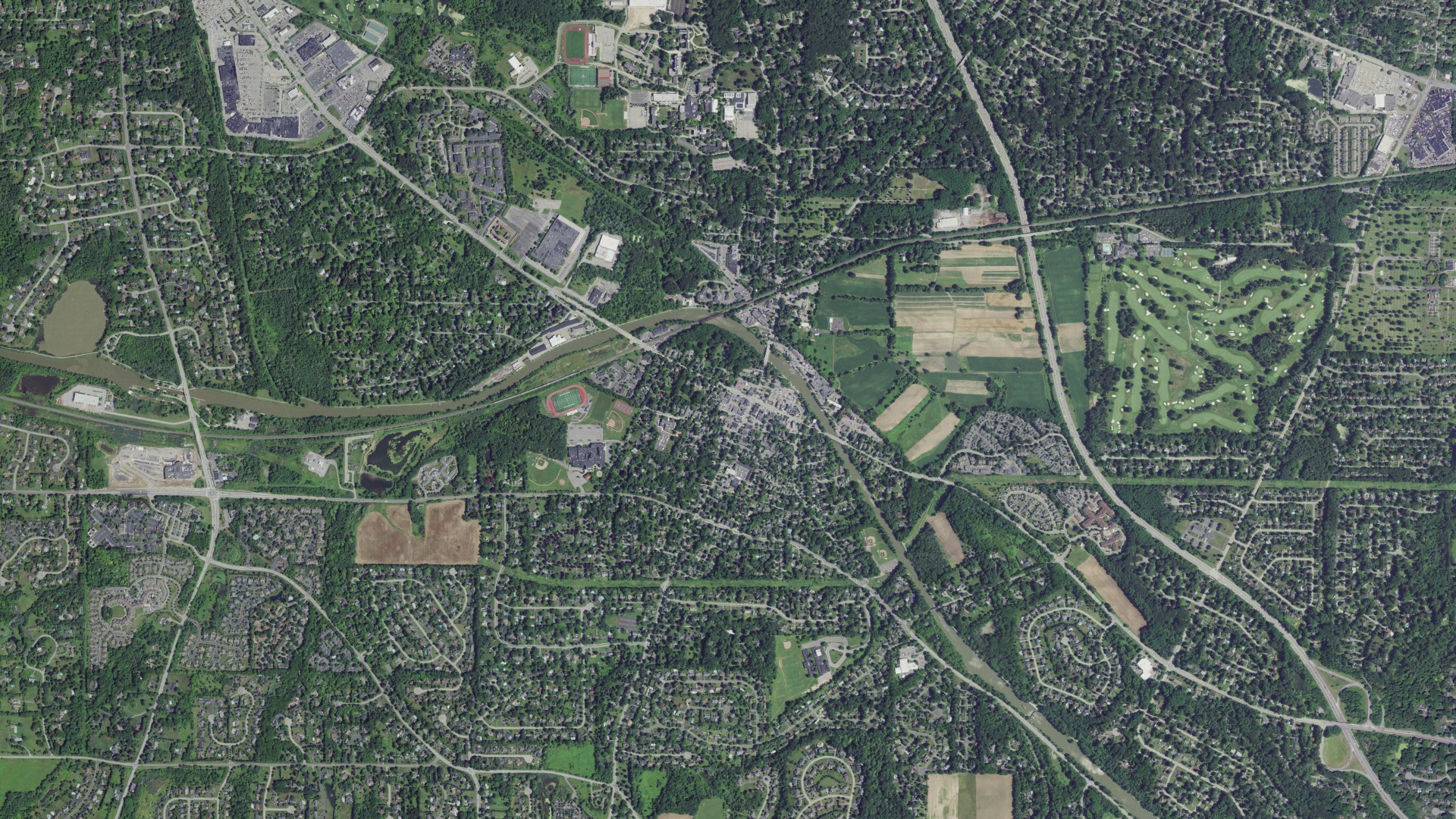 Natural-color aerial photograph of land around Pittsford, New York