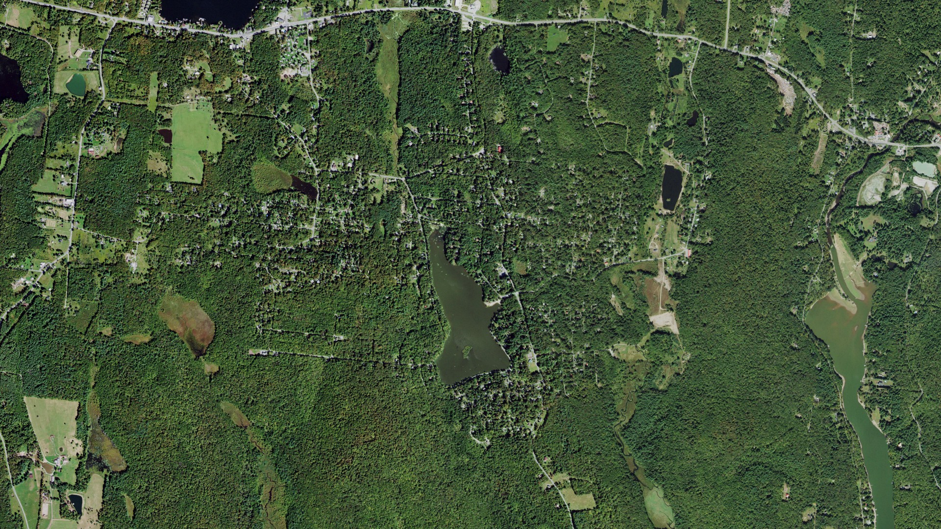 Natural-color aerial photograph of land around Smallwood, New York
