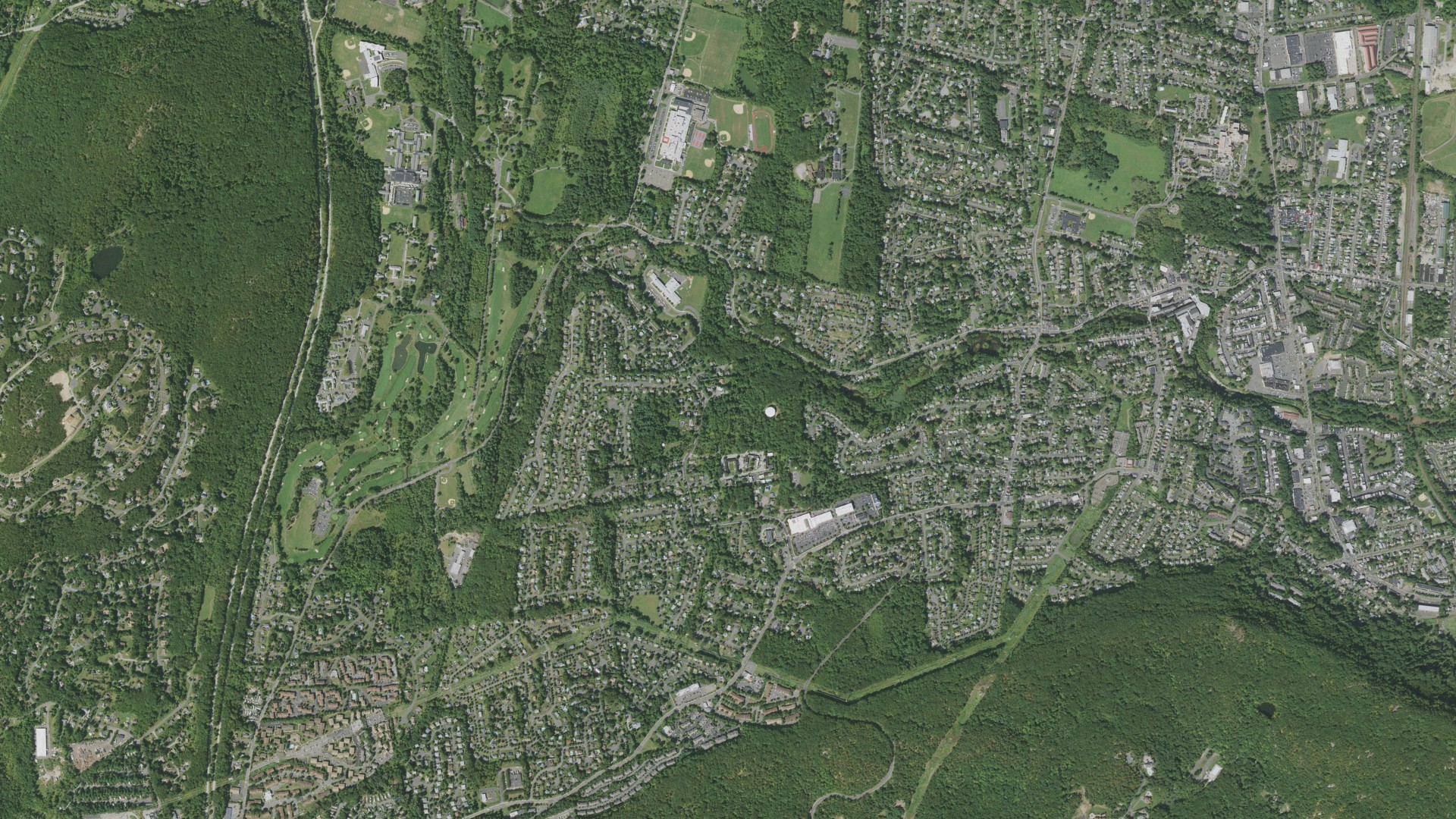 Natural-color aerial photograph of land around Thiells, New York