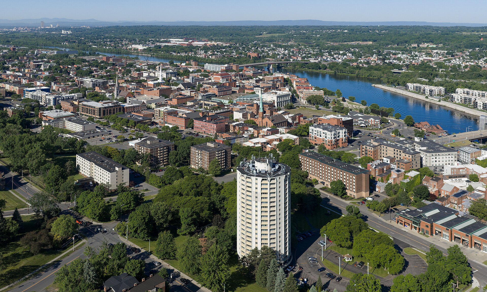 Skyline of Troy, New York (pop. 51,401). It's a historic Hudson River city known for its 19th-century architecture and former industrial economy in iron, steel, & textiles.